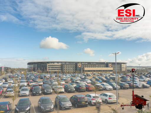 Surveillance trailer overseeing a stadium parking lot, ensuring attendee safety at a major public event.