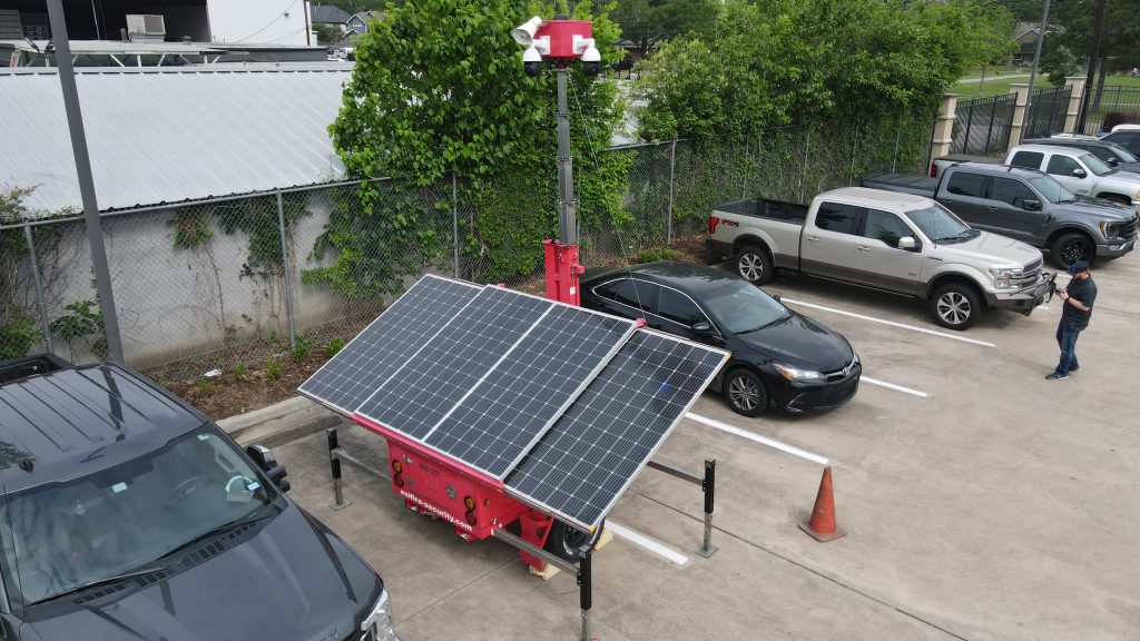 Surveillance trailer overseeing event security a parking lot, ensuring attendee safety at a major public event.